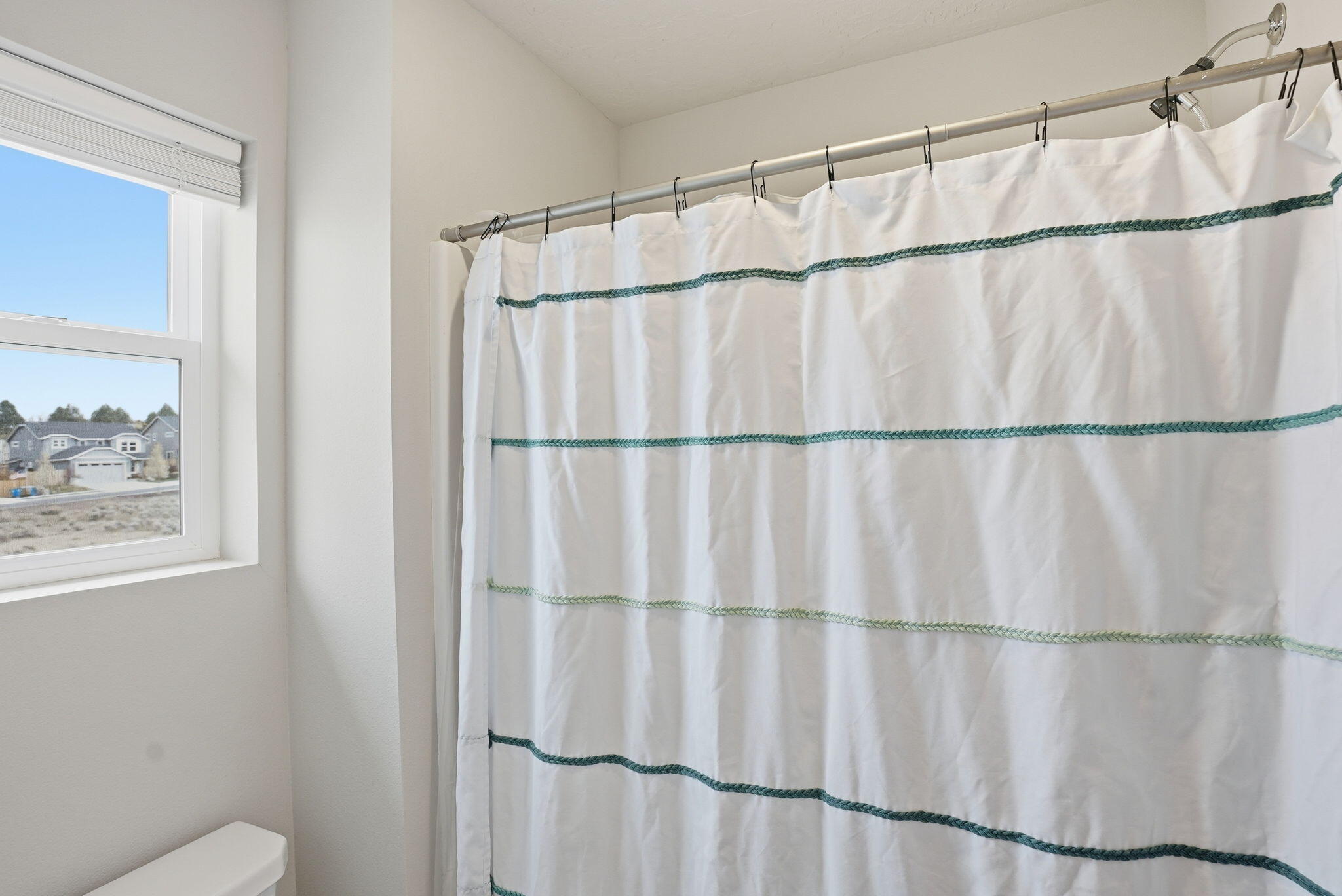 4015 Southwest Quartz Place Redmond, OR 97756 - Photo 22 of 35 a bathroom with a shower and a window