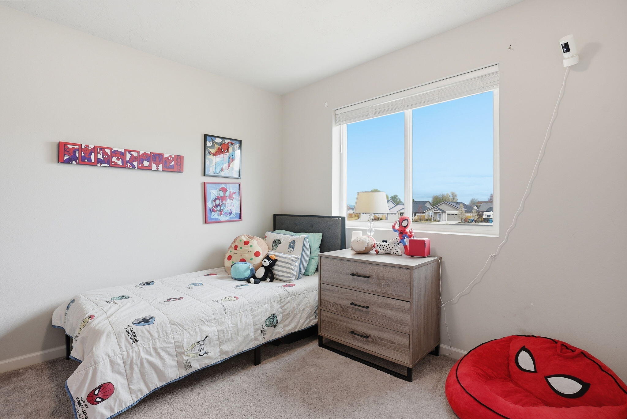 4015 Southwest Quartz Place Redmond, OR 97756 - Photo 23 of 35 a bedroom with a bed and a window