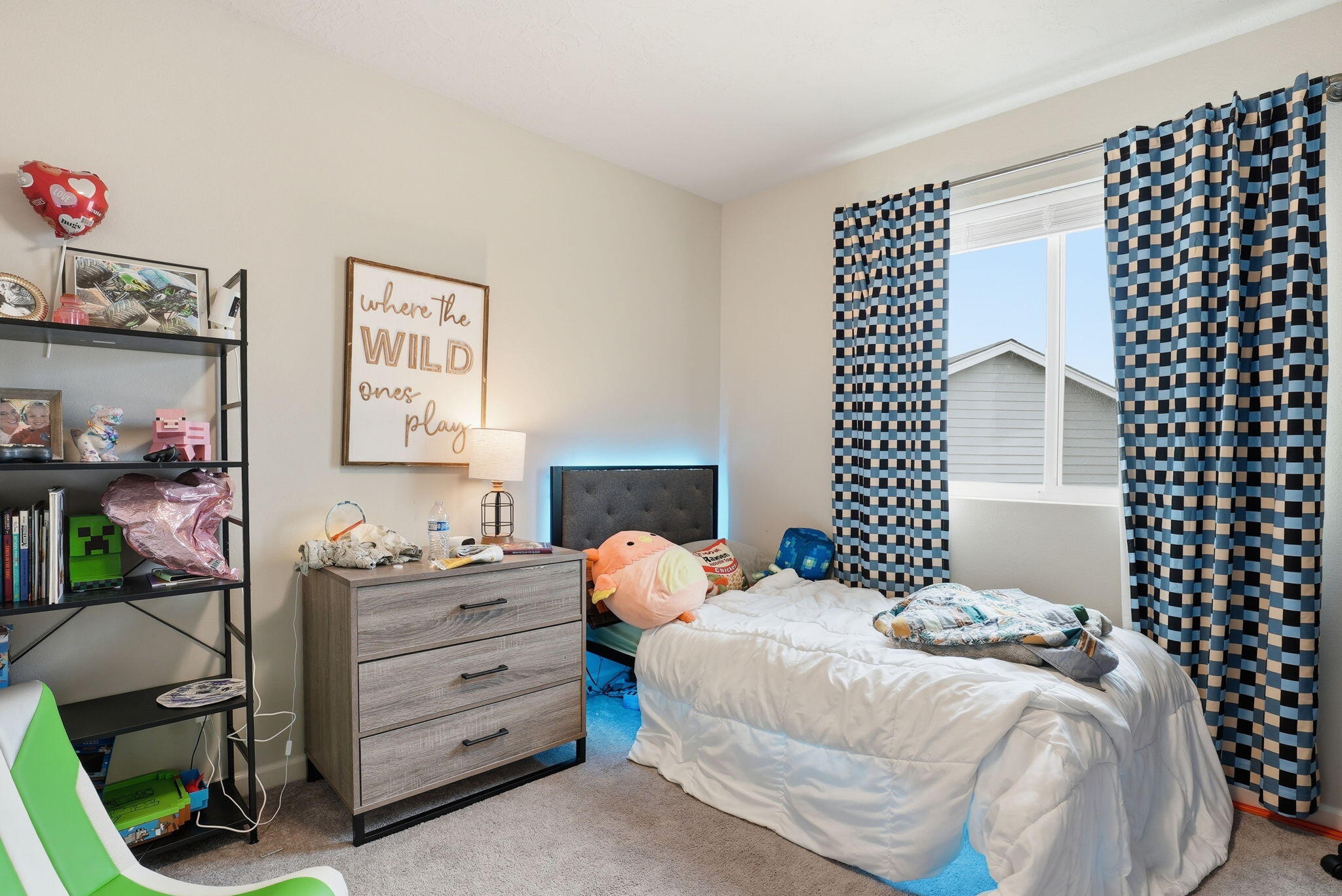 4015 Southwest Quartz Place Redmond, OR 97756 - Photo 25 of 35 a bedroom with a bed and a lamp on dresser