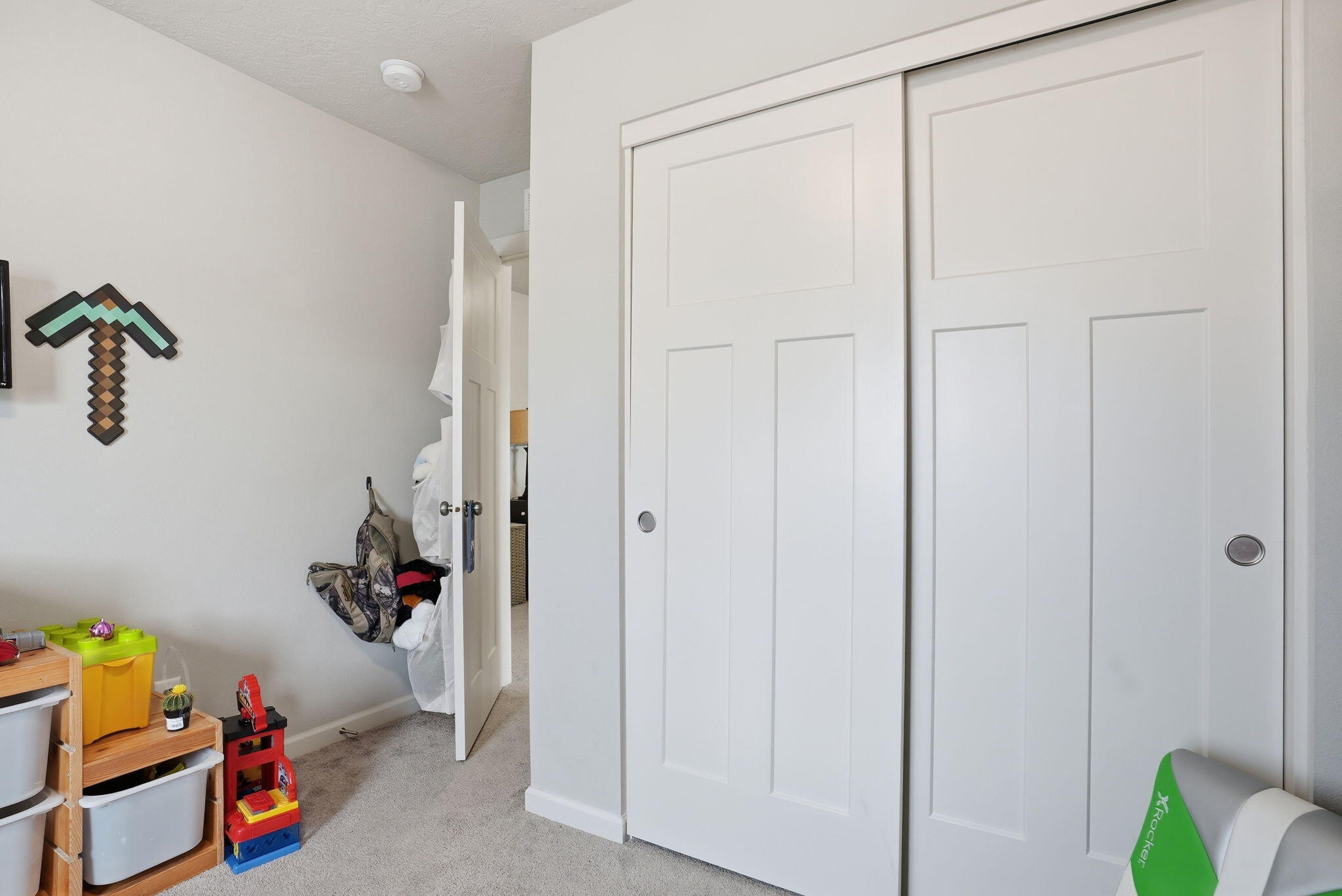 4015 Southwest Quartz Place Redmond, OR 97756 - Photo 26 of 35 a view of room with baby crib and couch