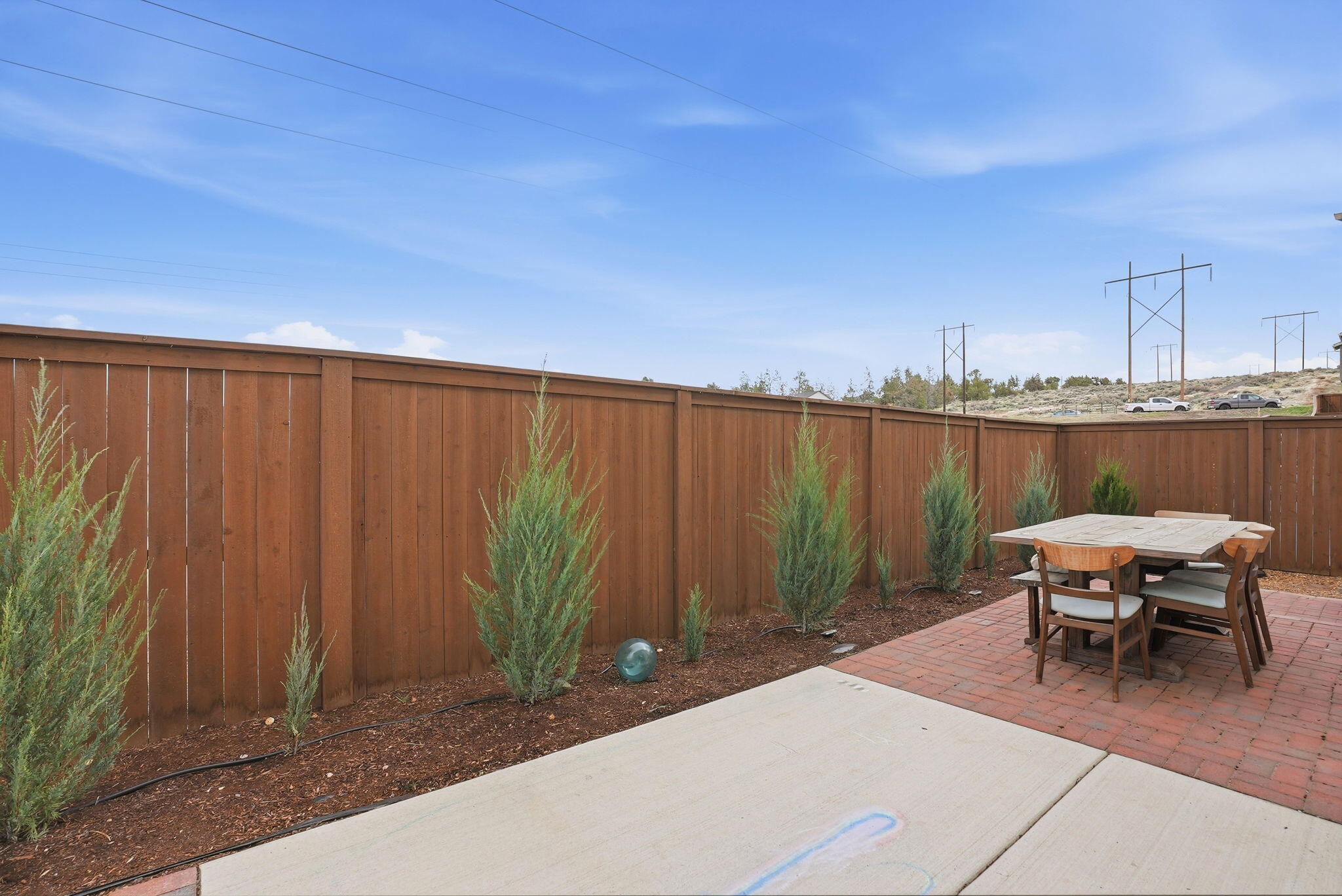 4015 Southwest Quartz Place Redmond, OR 97756 - Photo 31 of 35 a balcony with chairs and a table