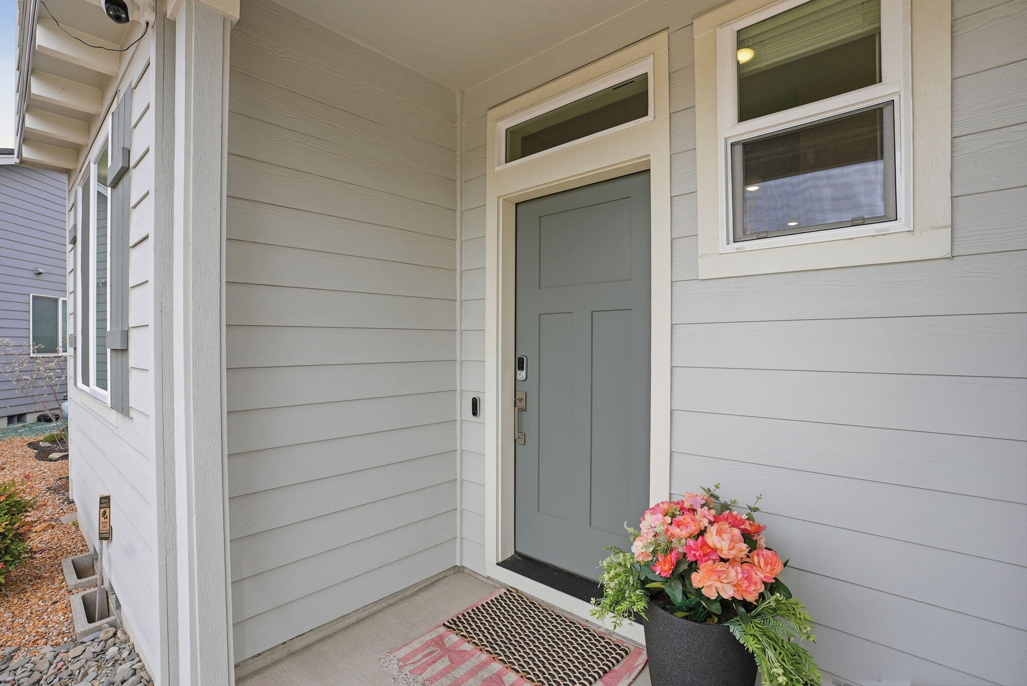 4015 Southwest Quartz Place Redmond, OR 97756 - Photo 5 of 35 a pink bench in front of a door
