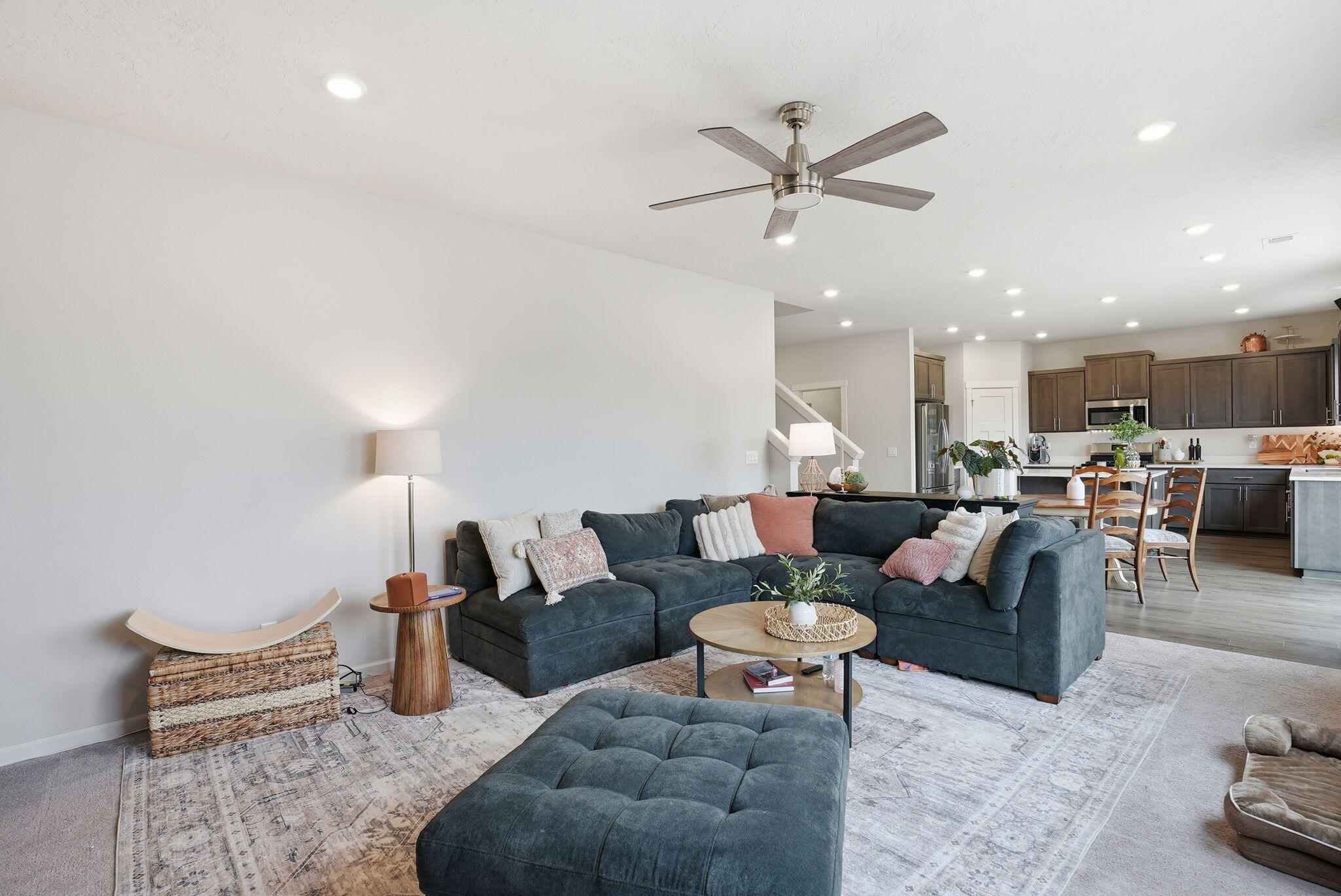 4015 Southwest Quartz Place Redmond, OR 97756 - Photo 7 of 35 a living room with furniture and a view of kitchen