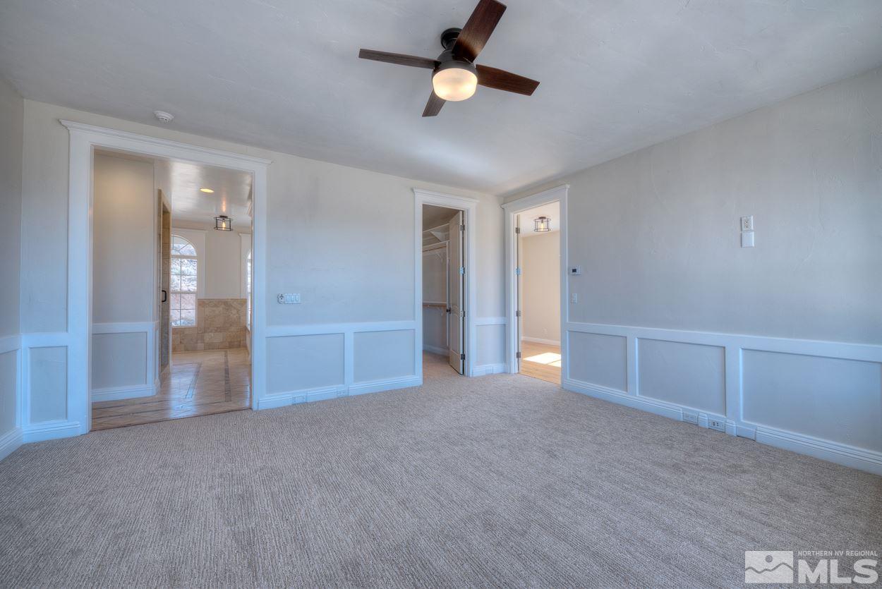 3220 Cartwright Road Reno, NV 89521 - Photo 15 of 25 a view of empty room with ceiling fan