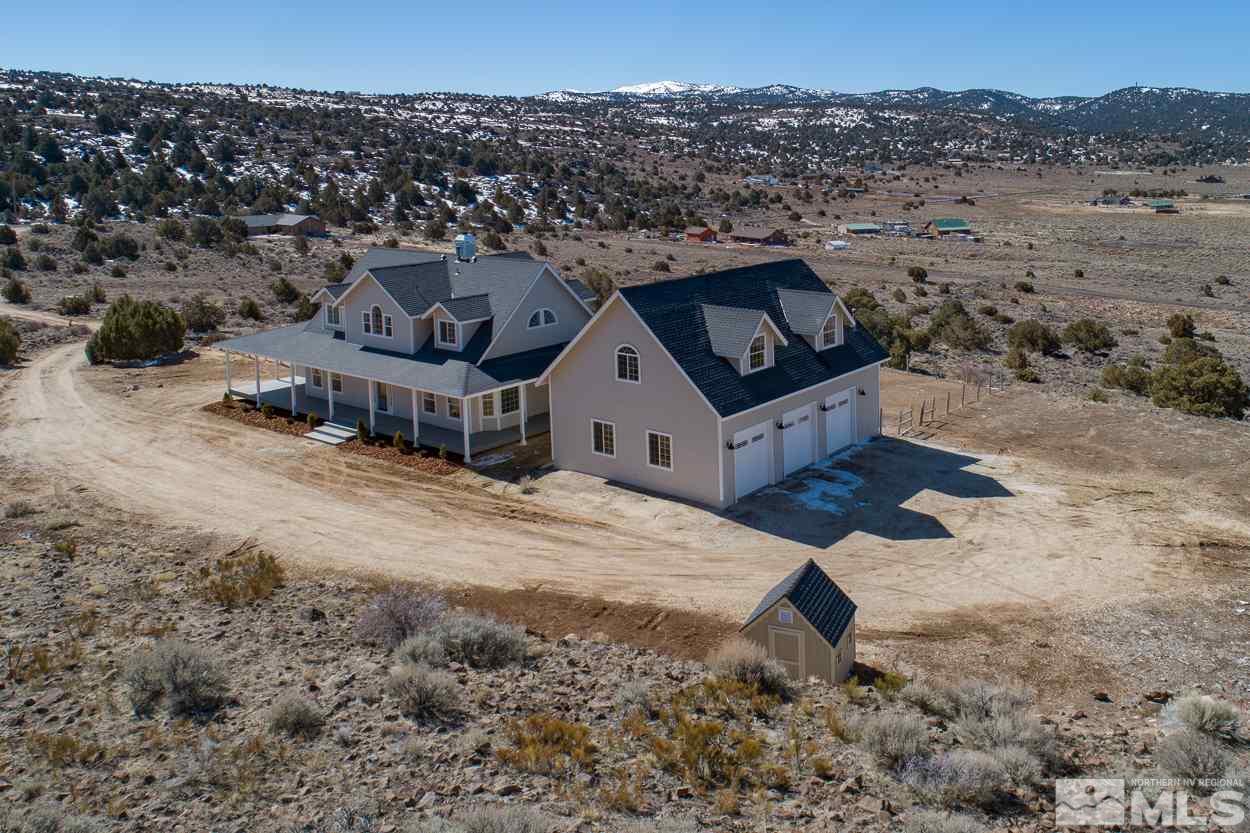 3220 Cartwright Road Reno, NV 89521 - Photo 2 of 25 a view of a house with a mountain
