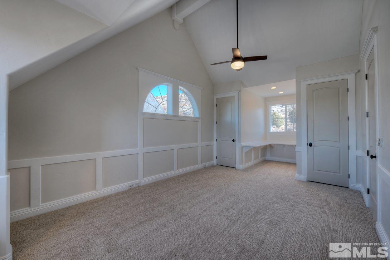 3220 Cartwright Road Reno, NV 89521 - Photo 21 of 25 an empty room with windows and fan