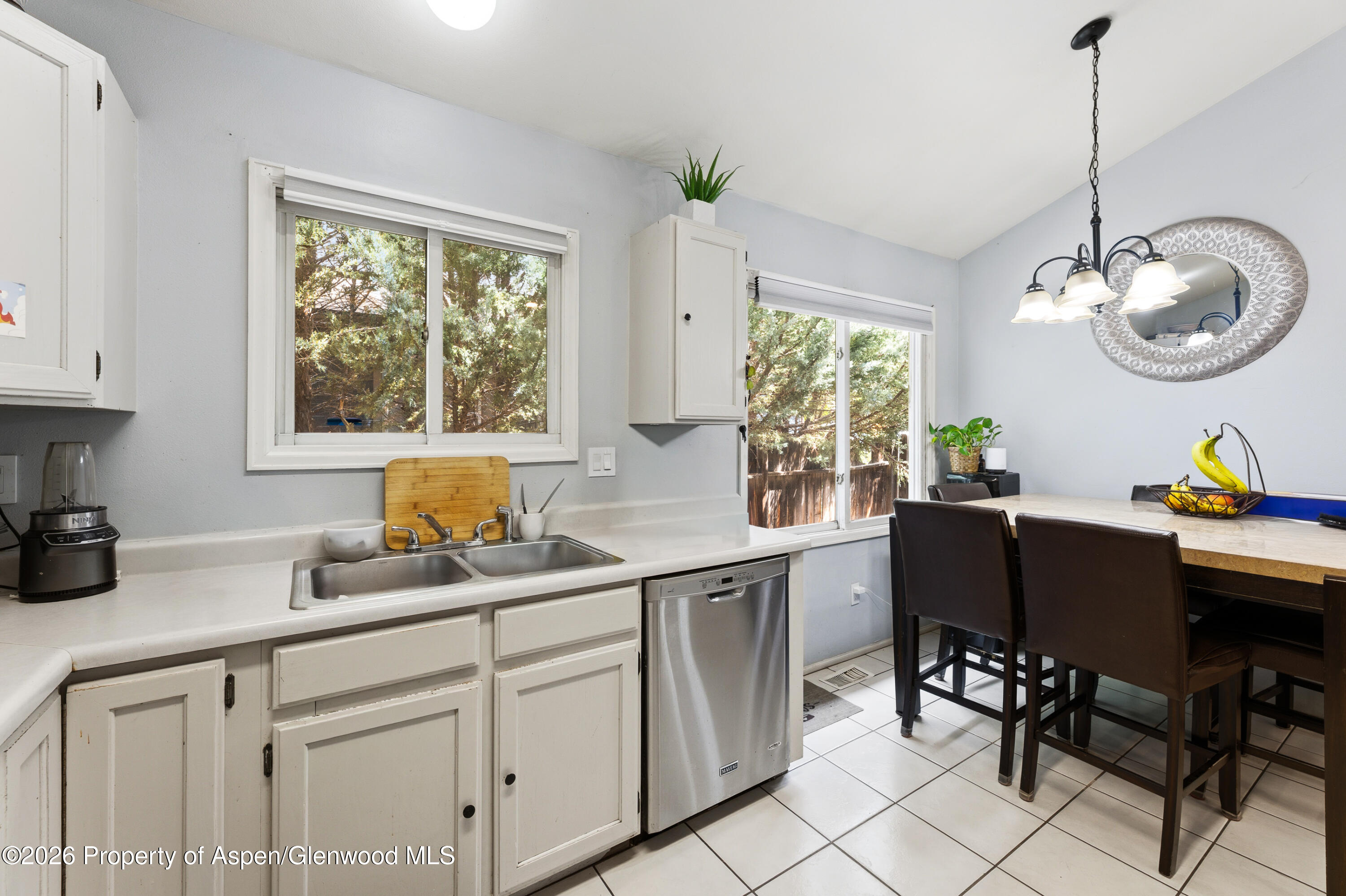 164 Current Drive New Castle, CO 81647 - Photo 16 of 34 a kitchen with a sink cabinets and window
