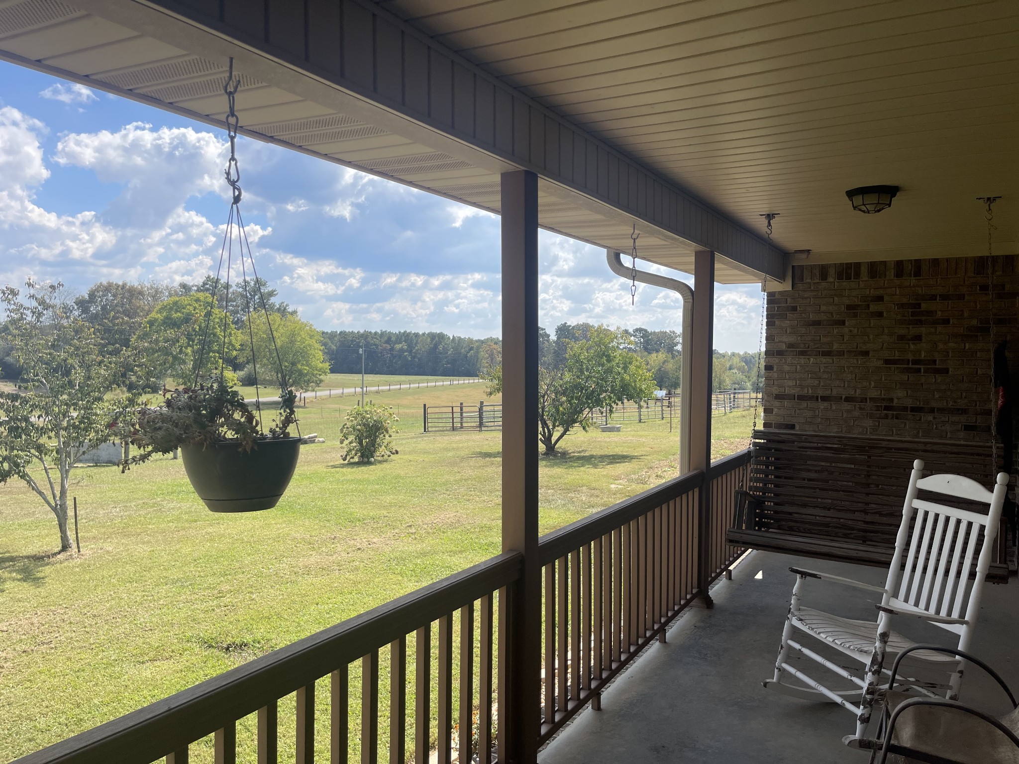 295 White Road Pulaski, TN 38478 - Photo 11 of 49 a view of a porch with a table and chairs