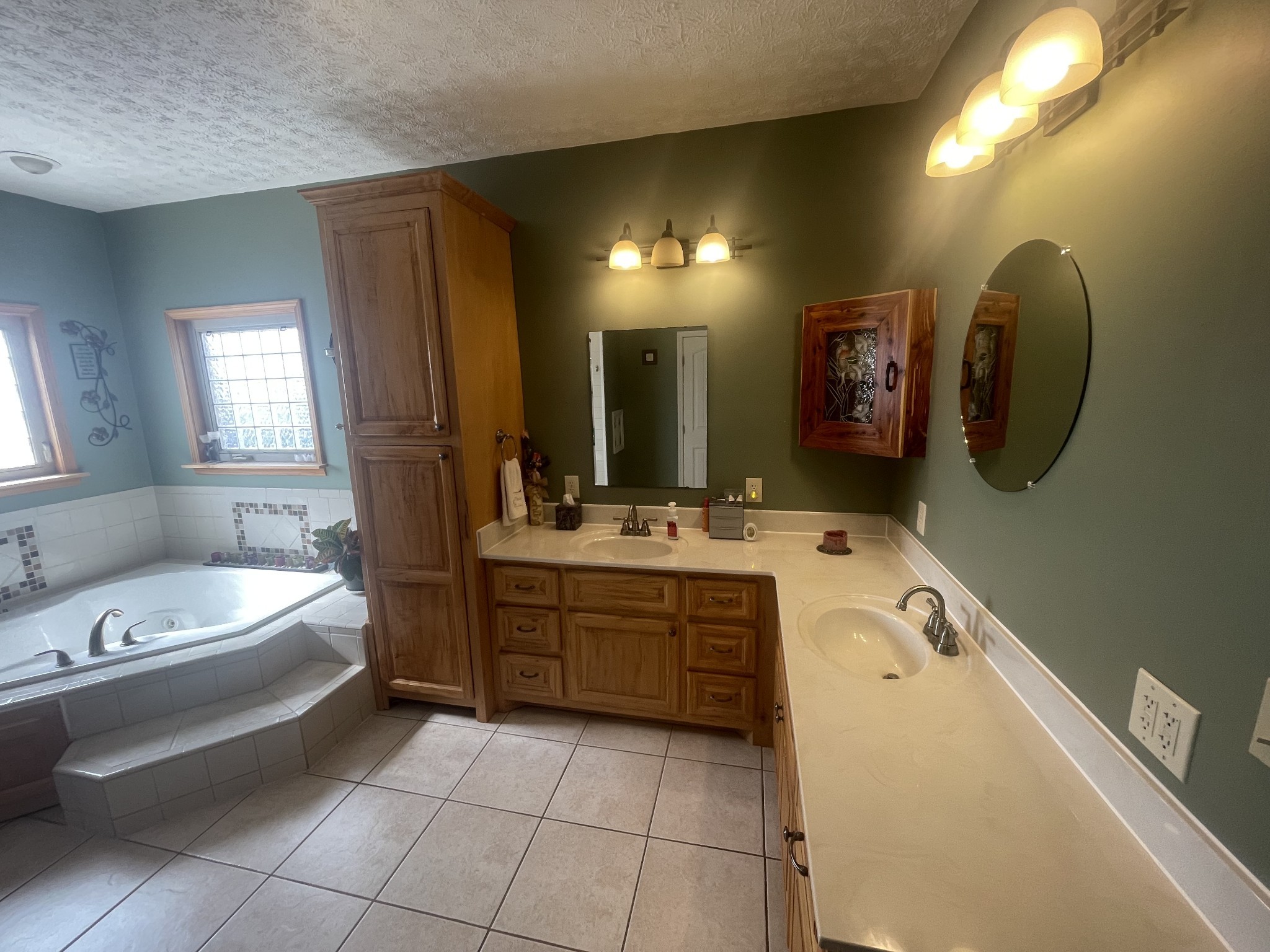 295 White Road Pulaski, TN 38478 - Photo 40 of 49 a bathroom with a tub sink and mirror