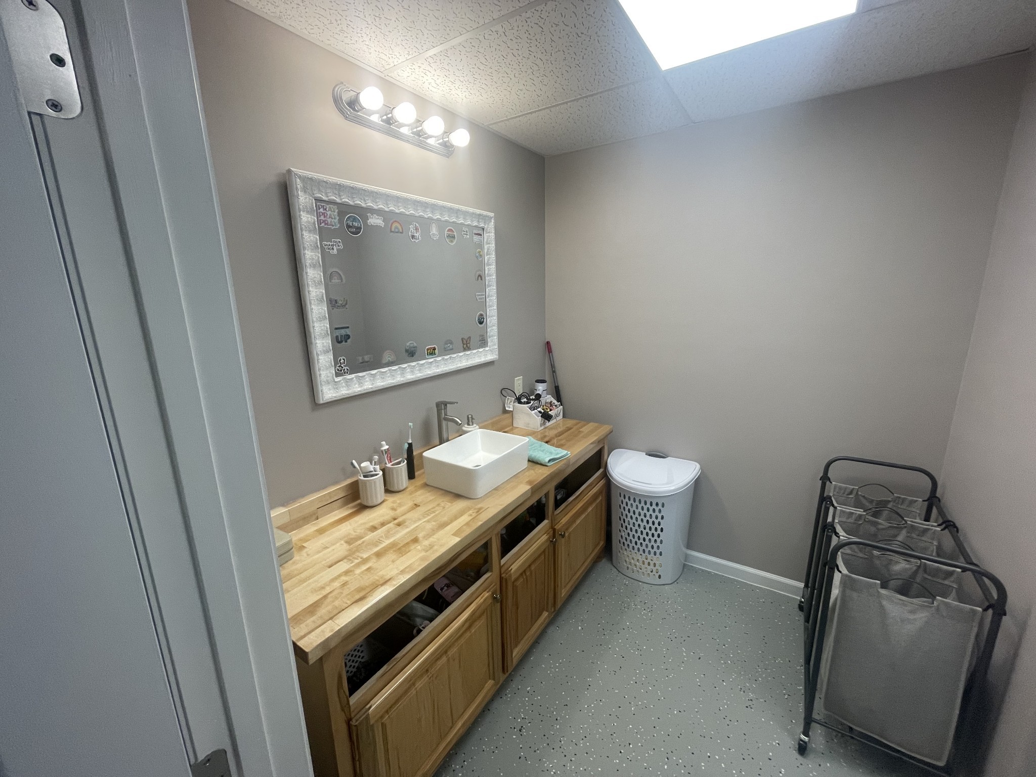 295 White Road Pulaski, TN 38478 - Photo 47 of 49 a bathroom with a granite countertop sink and a mirror