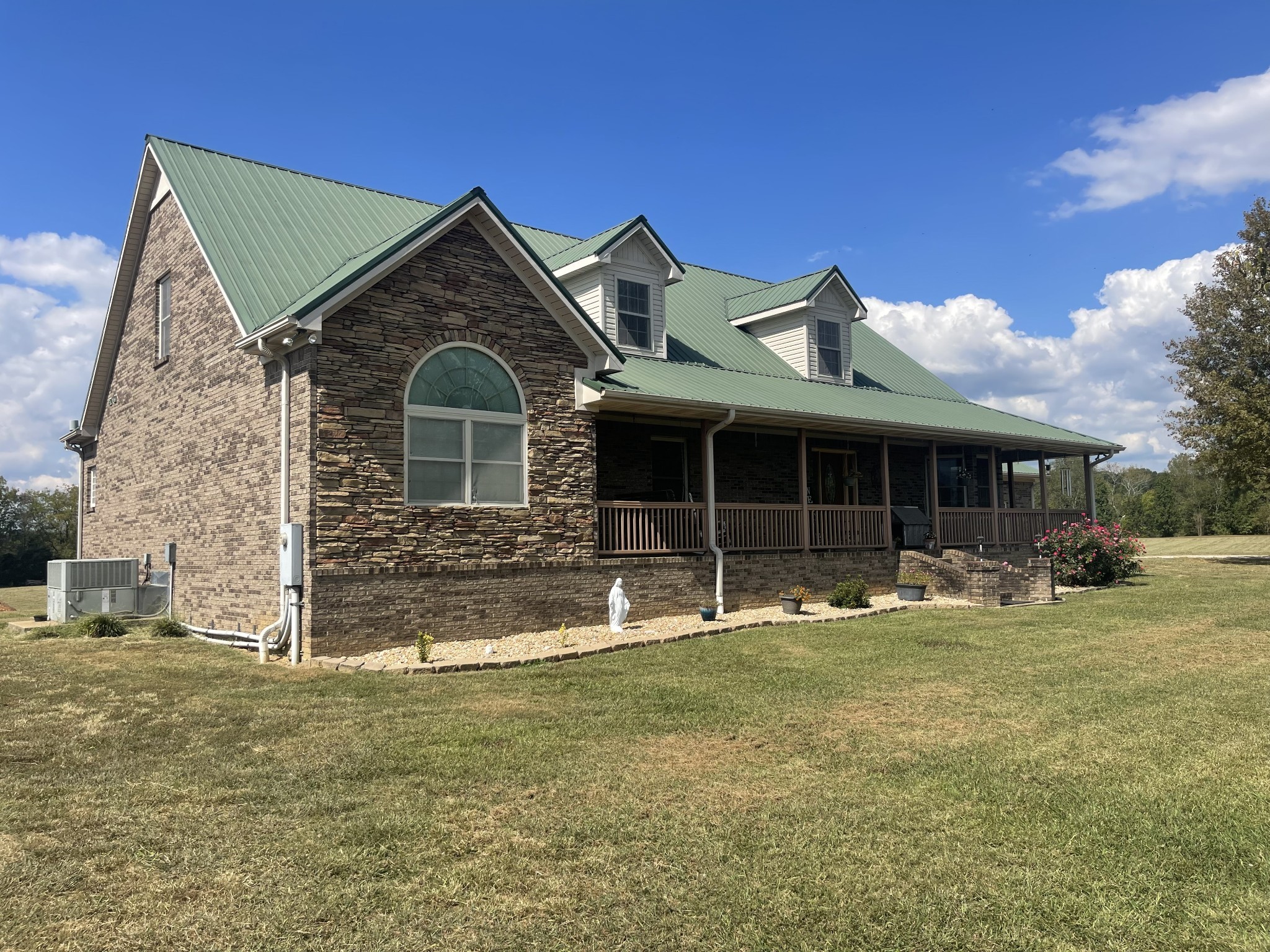 295 White Road Pulaski, TN 38478 - Photo 7 of 49 a front view of a house with a yard