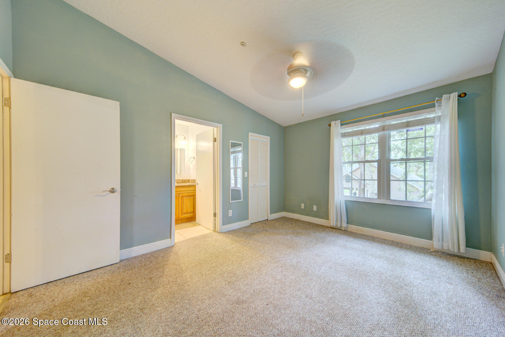 7667 North Wickham Road, Unit 1416 Melbourne, FL 32940 - Photo 10 of 41 a view of an empty room with a window
