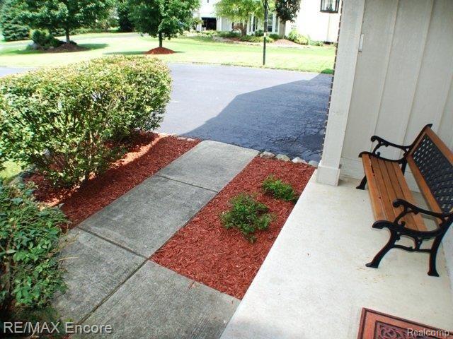 2119 Timber Ridge Court Highland, MI 48357 - Photo 2 of 22 Cozy front porch