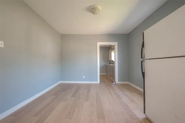 a view of a livingroom with wooden floor