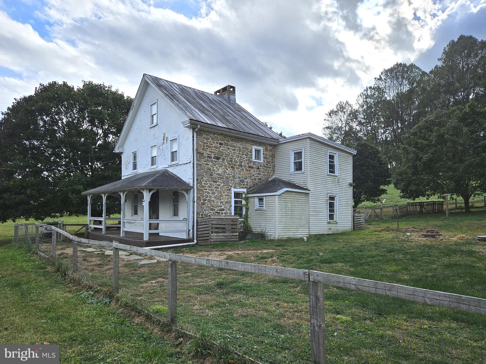 683 North Manor Road Elverson, PA 19520 - Photo 14 of 14 a front view of a house with a yard