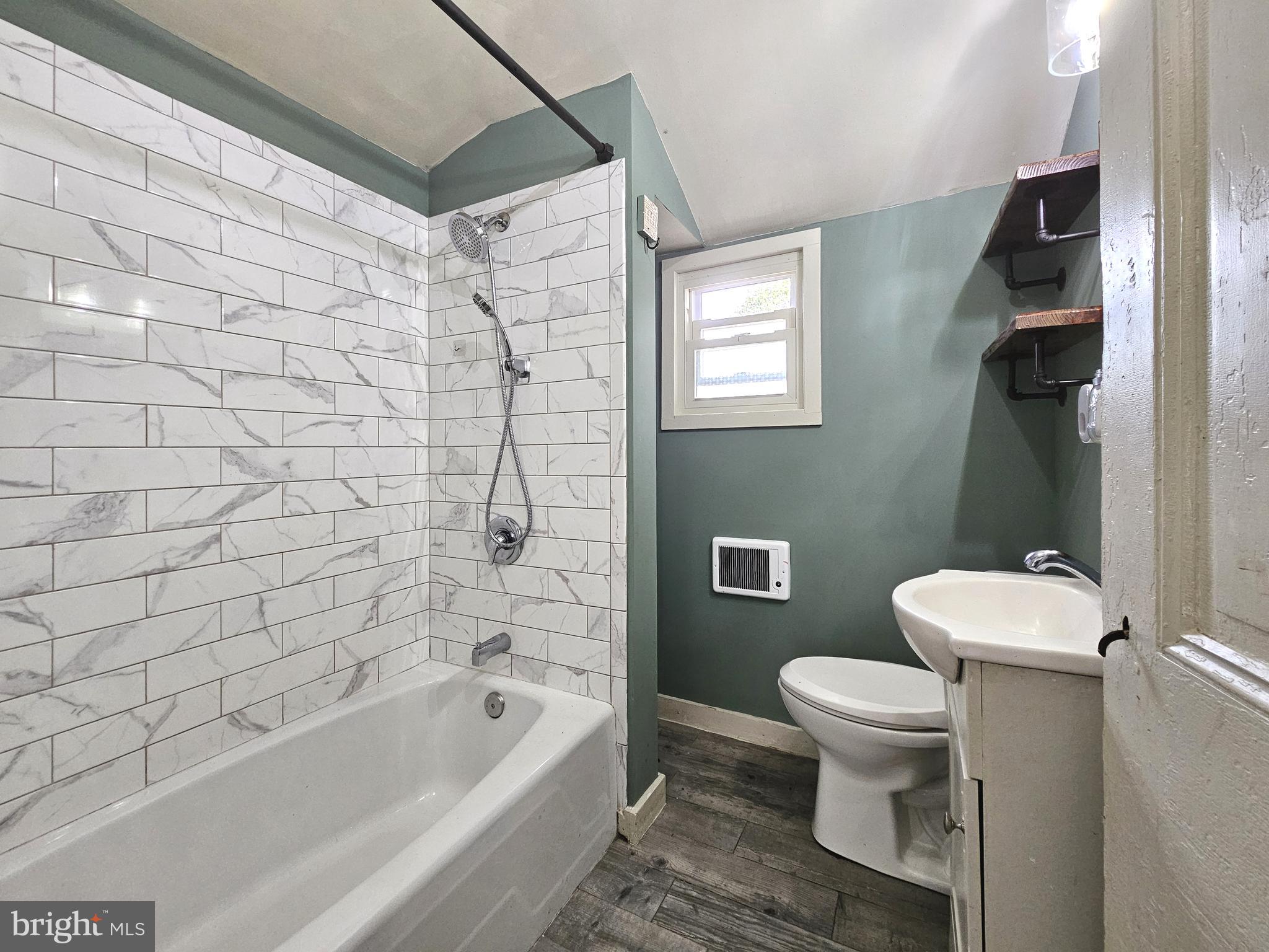 683 North Manor Road Elverson, PA 19520 - Photo 4 of 14 a bathroom with a toilet and a bathtub