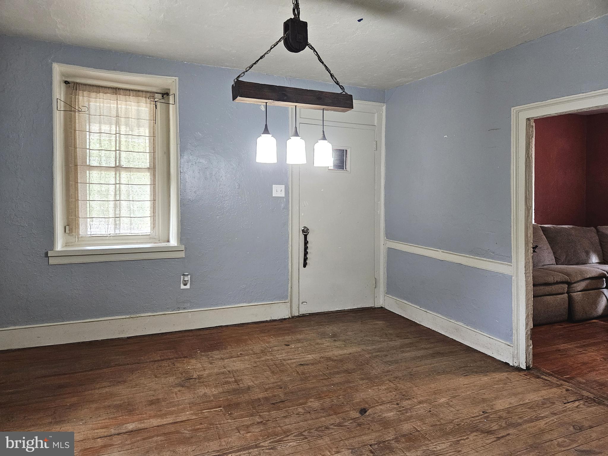 683 North Manor Road Elverson, PA 19520 - Photo 5 of 14 a view of an empty room with a window