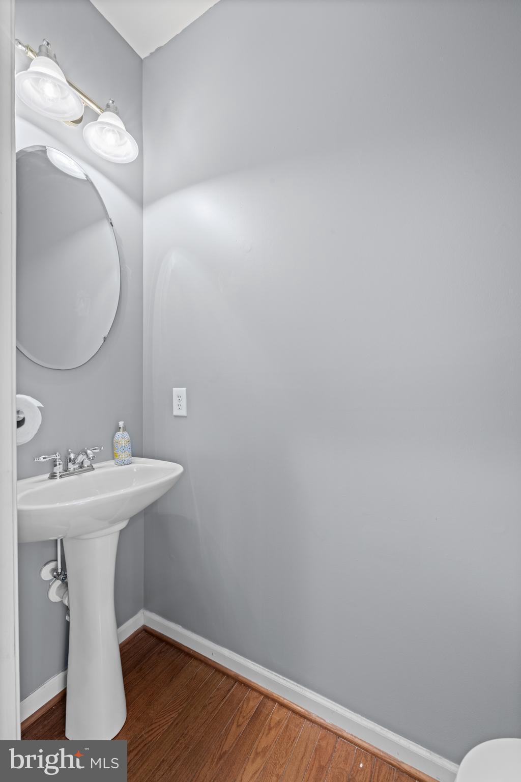 6 Huntingdon Court Marcus Hook, PA 19061 - Photo 14 of 35 a bathroom with a sink mirror and vanity