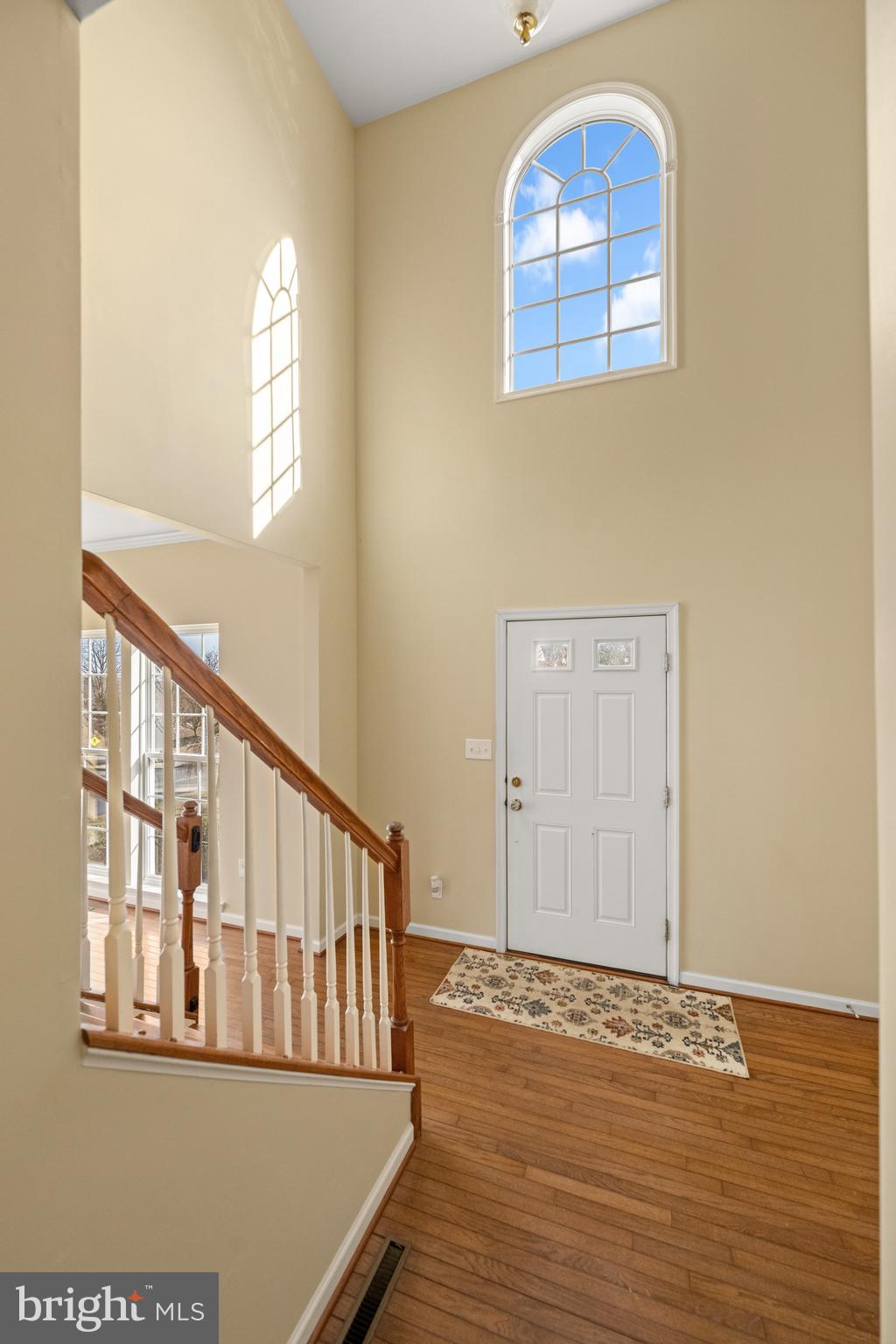 6 Huntingdon Court Marcus Hook, PA 19061 - Photo 2 of 35 a view of a hallway with wooden floor and entryway