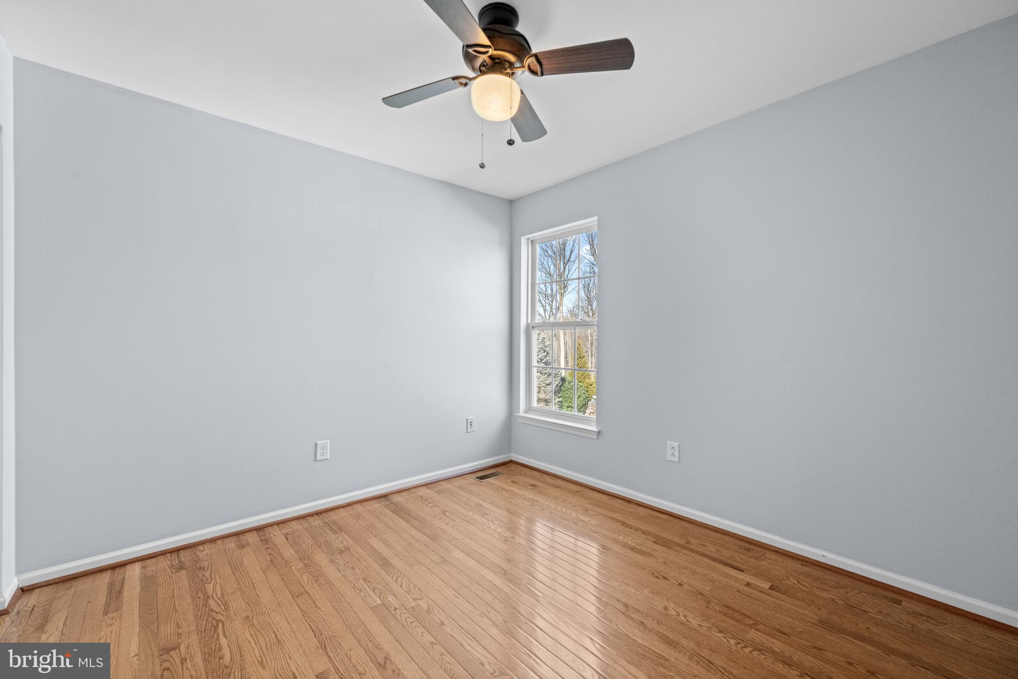 6 Huntingdon Court Marcus Hook, PA 19061 - Photo 20 of 35 wooden floor in an empty room with a window