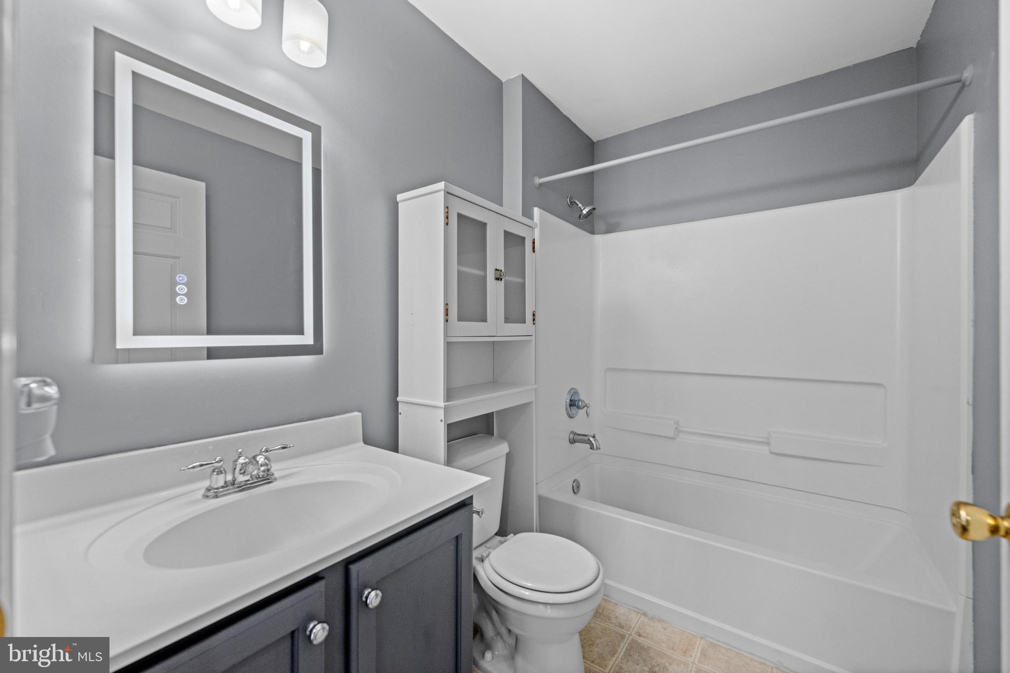 6 Huntingdon Court Marcus Hook, PA 19061 - Photo 22 of 35 a bathroom with a sink toilet and shower