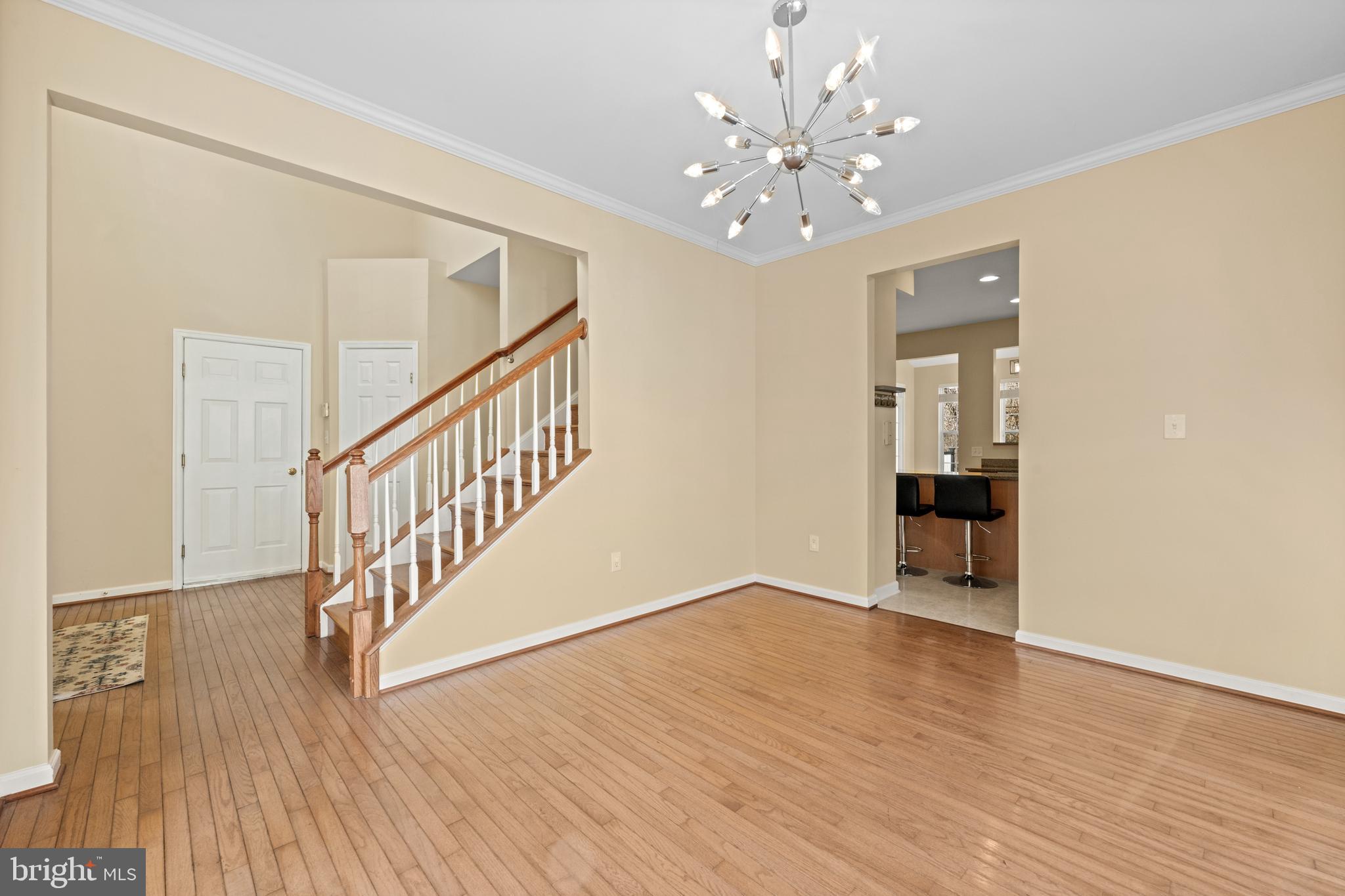 6 Huntingdon Court Marcus Hook, PA 19061 - Photo 4 of 35 a view of entryway and hall with wooden floor