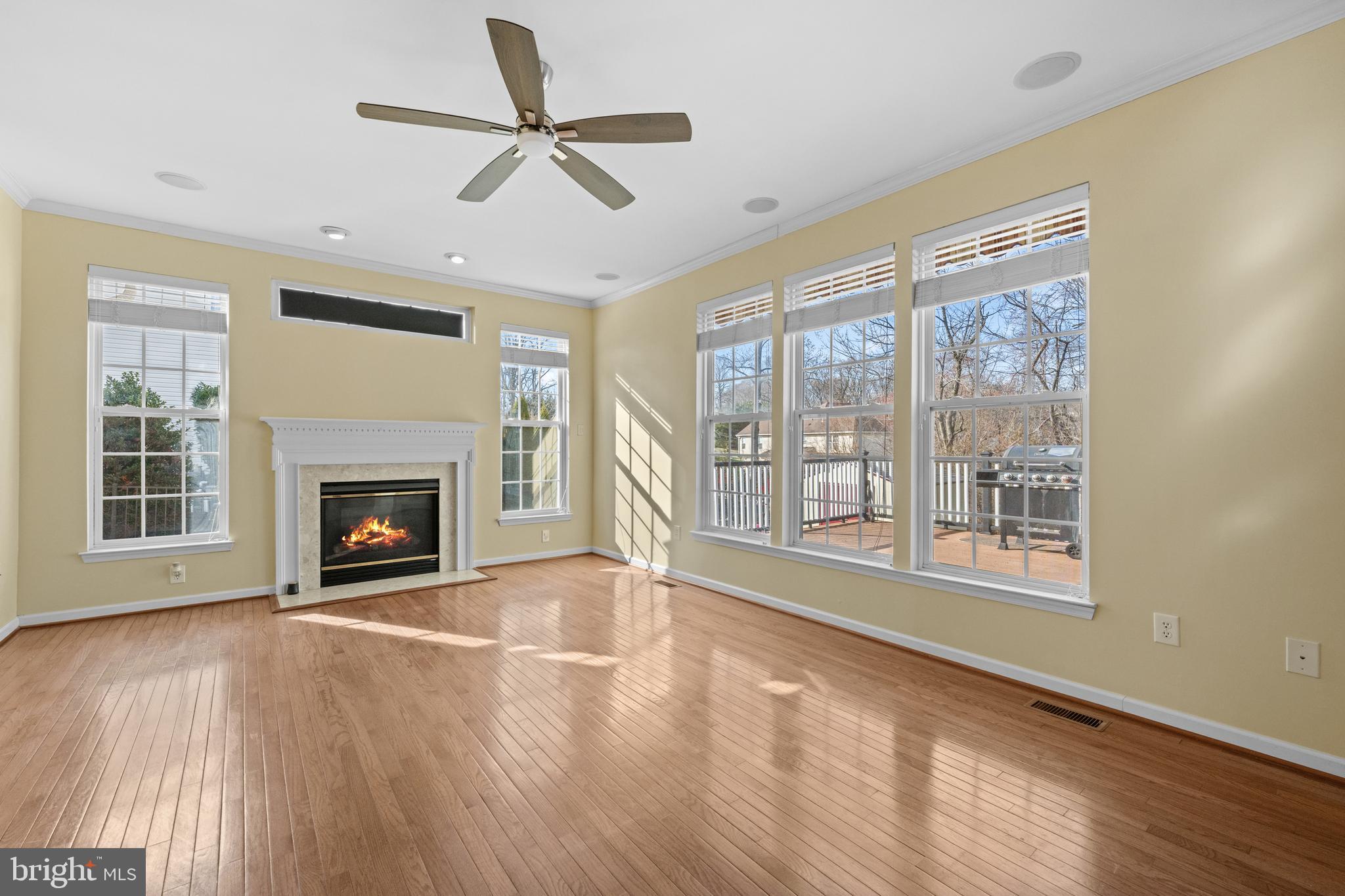 6 Huntingdon Court Marcus Hook, PA 19061 - Photo 6 of 35 a view of an empty room with a fireplace and a window