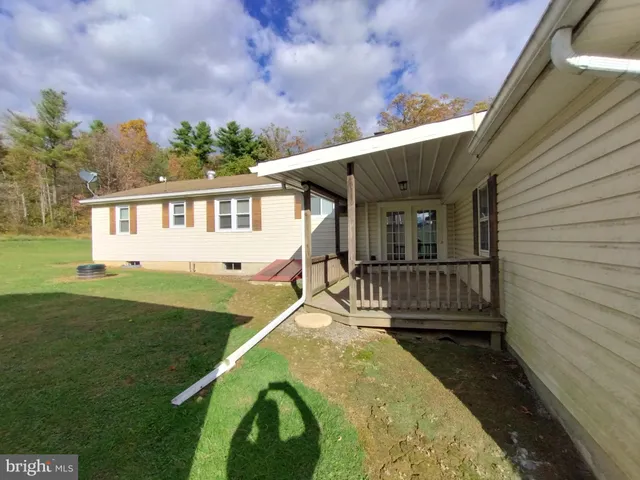 a house view with a garden space