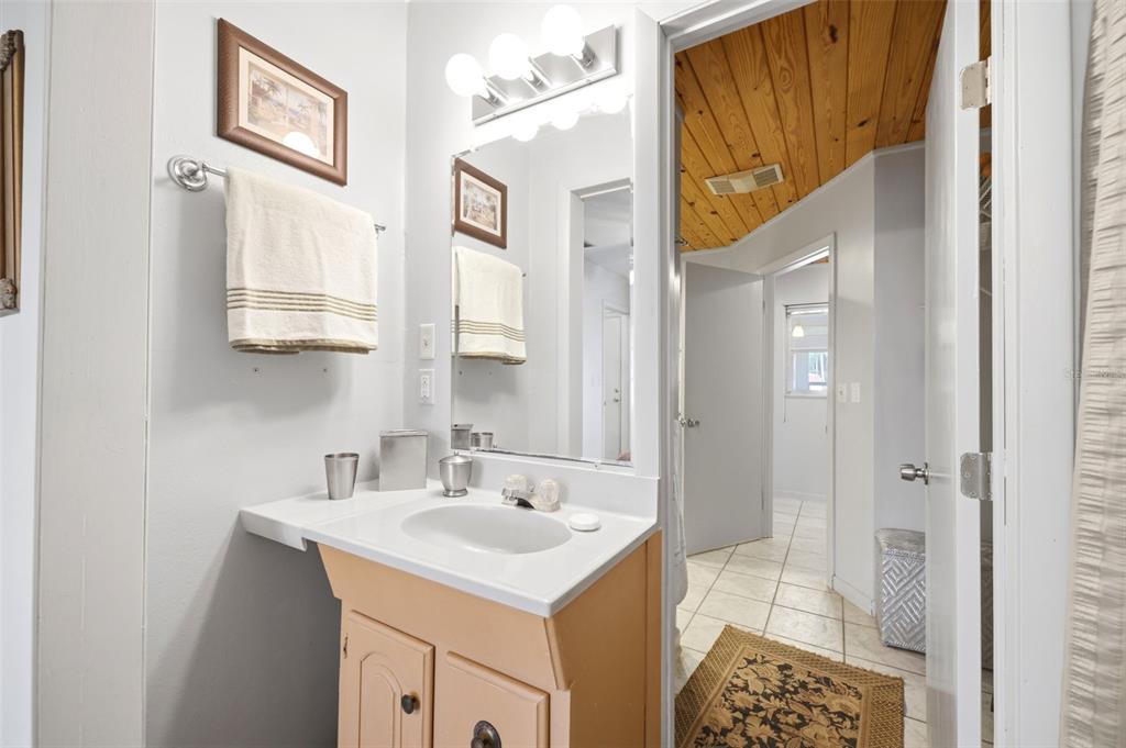 1830 South Mandarin Terrace Inverness, FL 34450 - Photo 45 of 47 a bathroom with a sink and a mirror