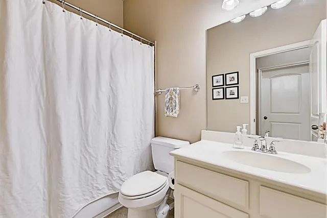 a view of a house with backyard porch and sitting area