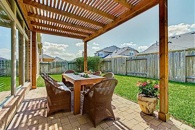 a view of a porch in front of house