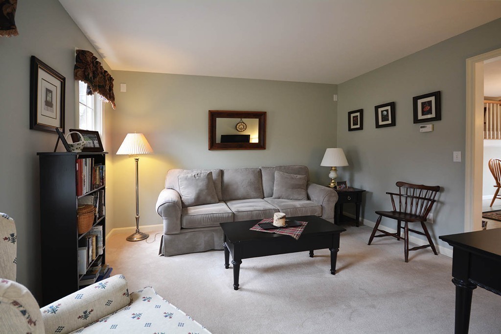 5 Ridge Road Pepperell, MA 01463 - Photo 12 of 25 a living room with furniture and a flat screen tv