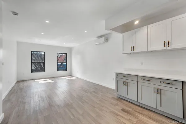 a view of kitchen with wooden floor