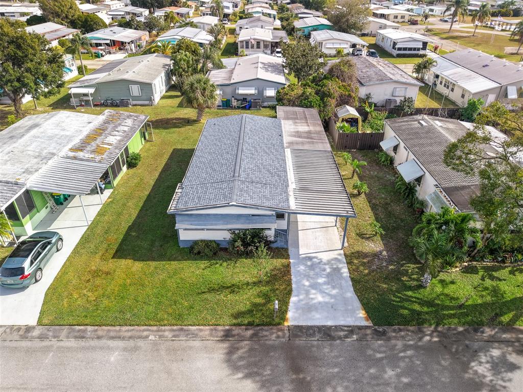 562 Ruth Circle Melbourne, FL 32904 - Photo 19 of 21 an aerial view of residential houses with yard