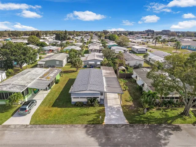 a view of a houses with a yard