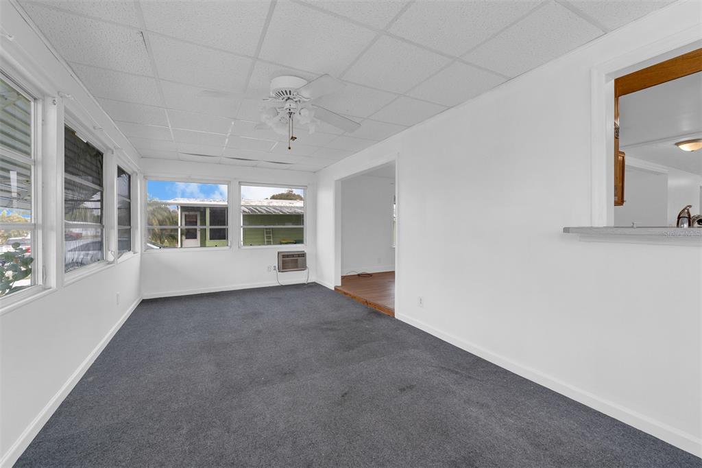 562 Ruth Circle Melbourne, FL 32904 - Photo 3 of 21 a view of an empty room with a window