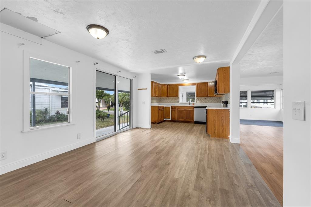 562 Ruth Circle Melbourne, FL 32904 - Photo 8 of 21 a view of kitchen and wooden floor