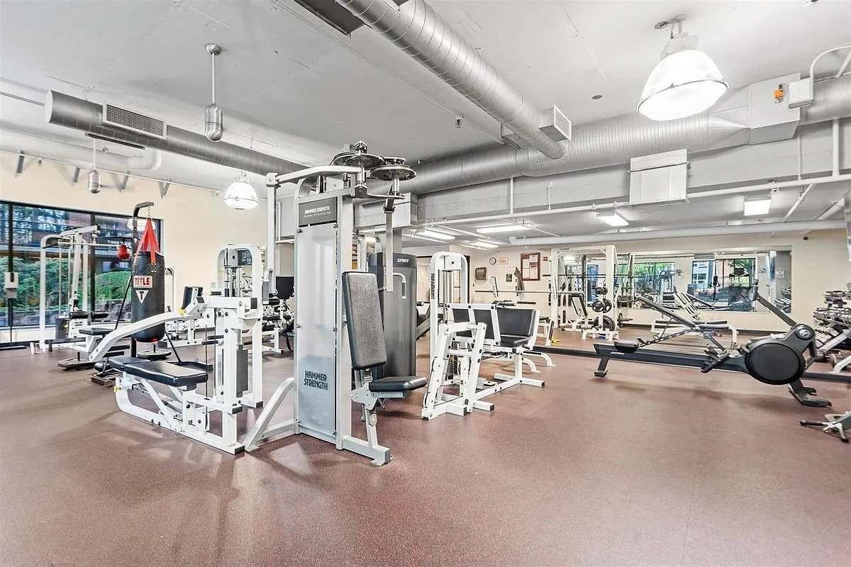 700 Grove Street, Unit 12F Jersey City, NJ 07310 - Photo 25 of 27 a view of a room with gym equipment