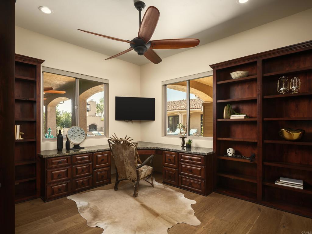 15731 Via De Santa Fe Rancho Santa Fe, CA 92067 - Photo 19 of 39 a room with a flat screen tv and furniture