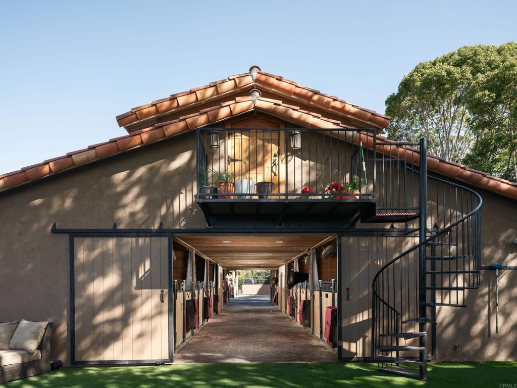 15731 Via De Santa Fe Rancho Santa Fe, CA 92067 - Photo 30 of 39 a front view of house with yard