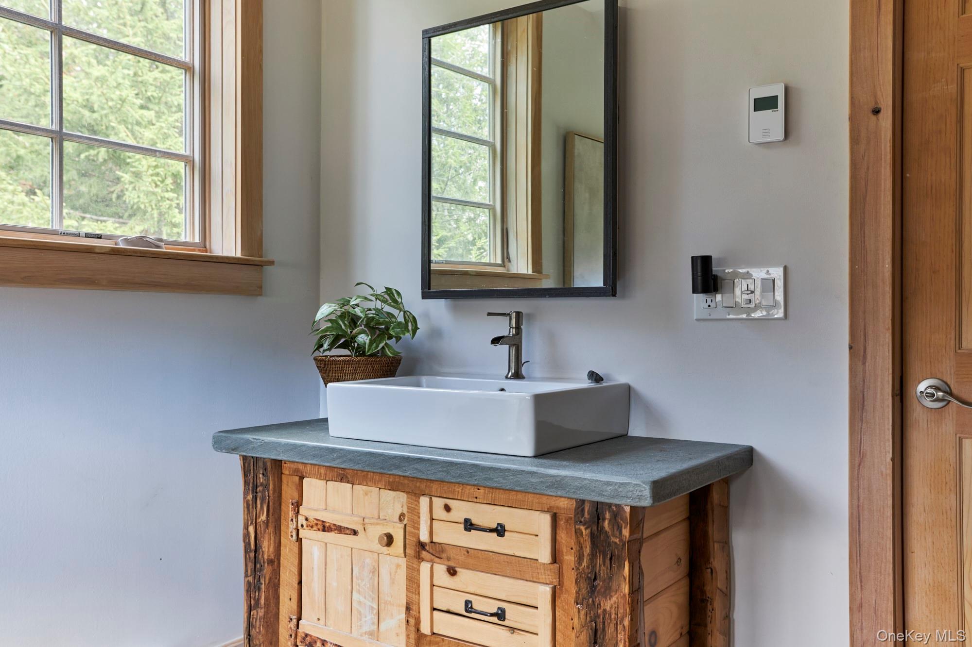 1681 Platte Clove Road Hunter, NY 12427 - Photo 20 of 23 a bathroom with a sink and a window