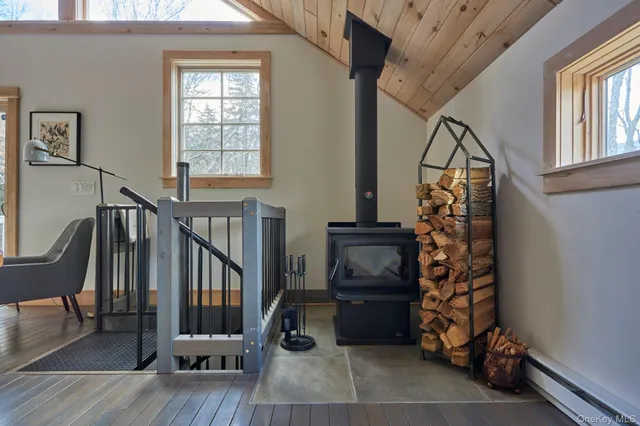 a view of entryway with wooden floor and stairs