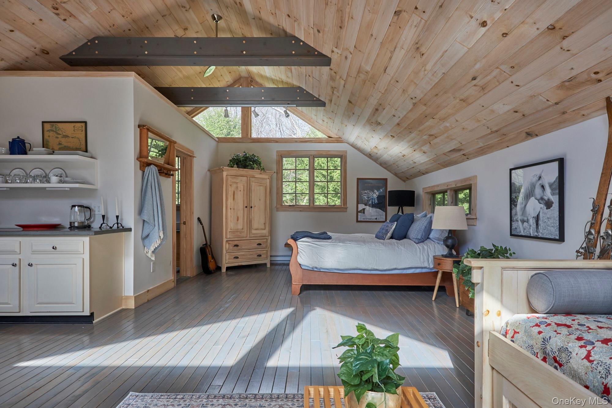 1681 Platte Clove Road Hunter, NY 12427 - Photo 8 of 23 a living room with furniture and paintings on the wall