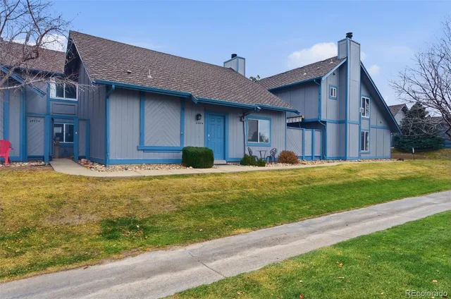 a house view with a garden space