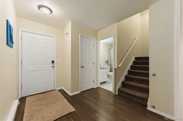 a view of entryway with wooden floor