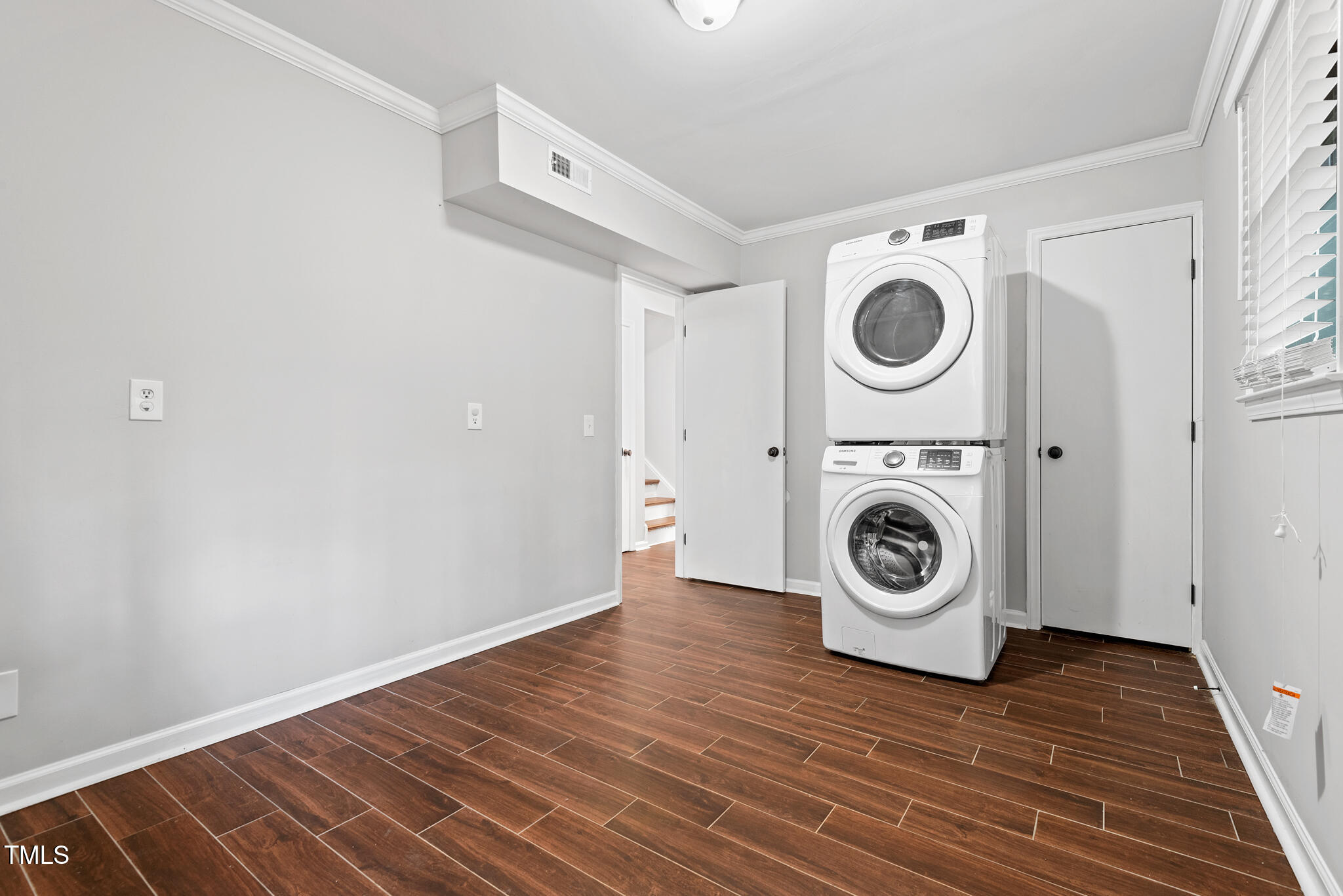 7309 Barberry Court Raleigh, NC 27615 - Photo 24 of 43 a utility room with dryer and washer