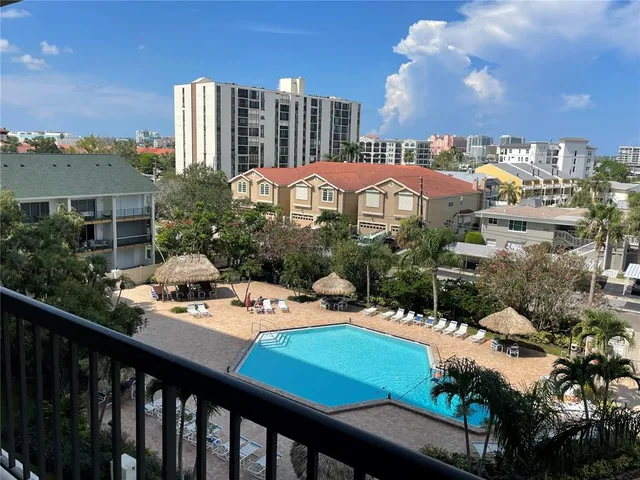 a view of a balcony with an outdoor space