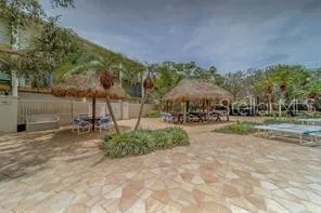 a view of a park with plants and a bench