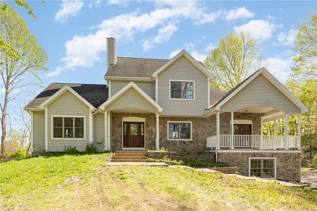 255 Bluhm Road Perinton, NY 14450 - Photo 1 of 1 255 Bluhm Built into the hillside