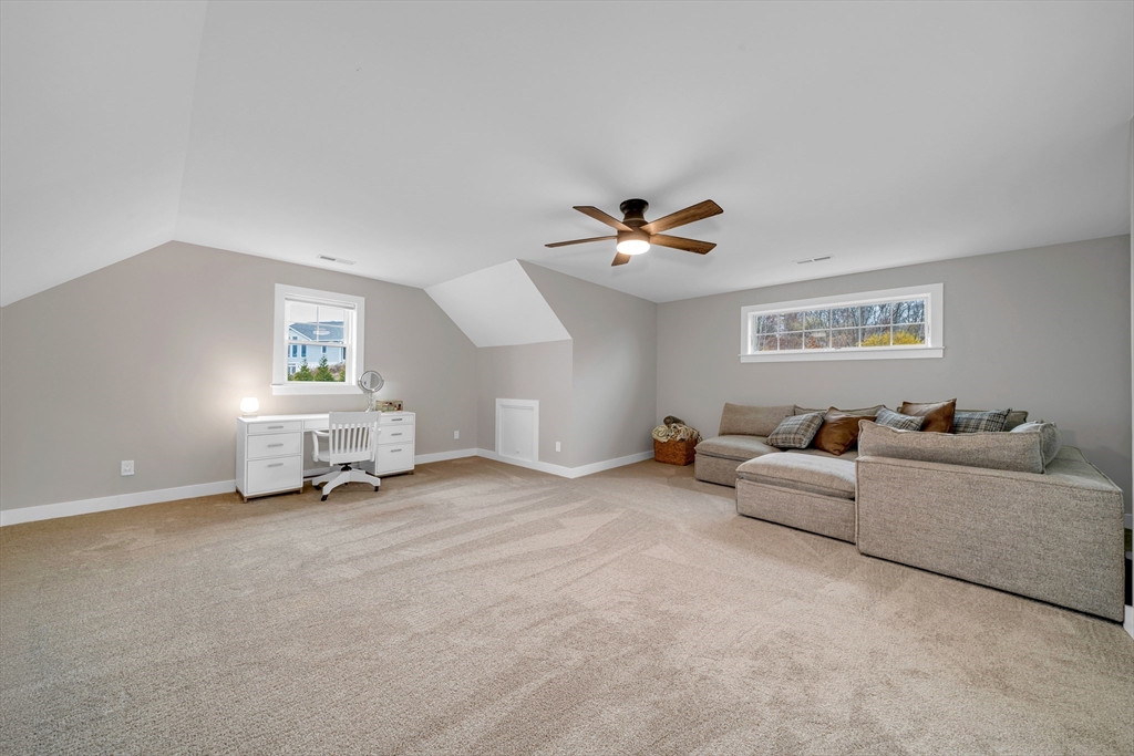 122 Seven Sister Road Haverhill, MA 01830 - Photo 23 of 33 a living room with furniture and a ceiling fan